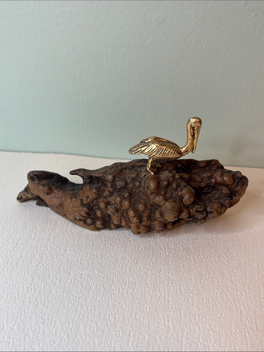 Gold Pelican Figurine on Brown Driftwood Base